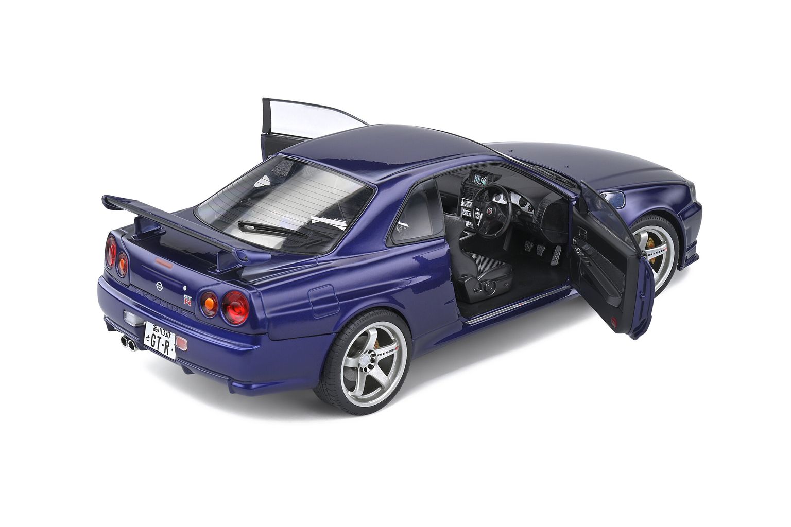 Nissan R34 GTR 1999 midnight purple 1:18 Solido
