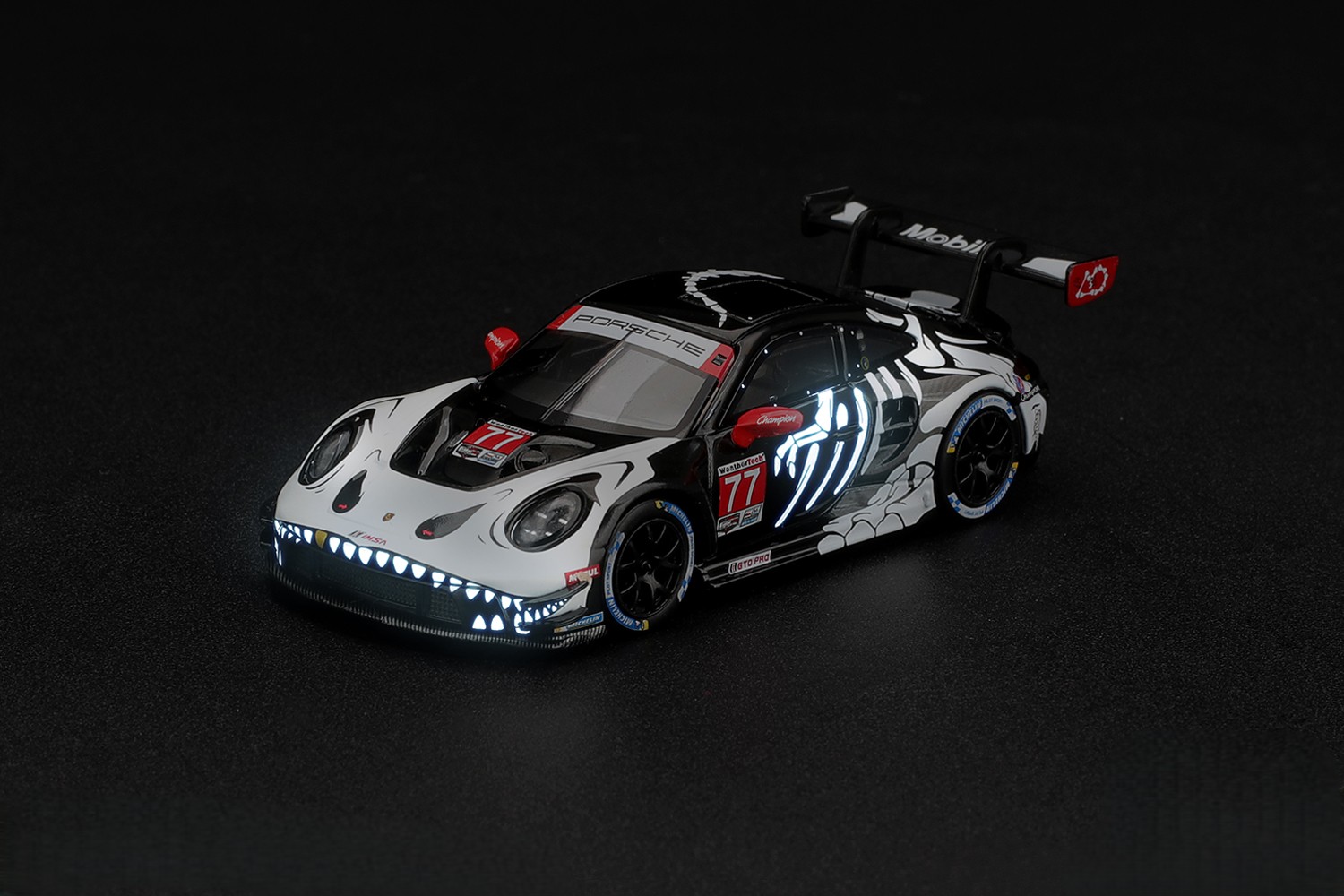 Porsche 911 (992) GT3 AO Racing #77 N.Tandy/H.King/A.Picariello *Skeleton Rexy* IMSA Petit Le Mans 2026 1:64 Mini GT