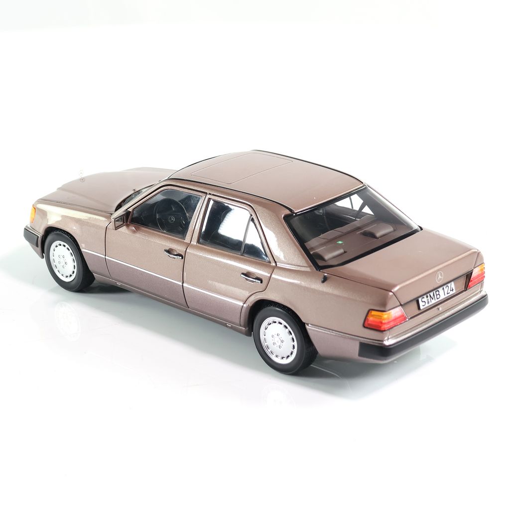 Mercedes-Benz 230 E W124 1989 dark beige metallic 1:18 Norev