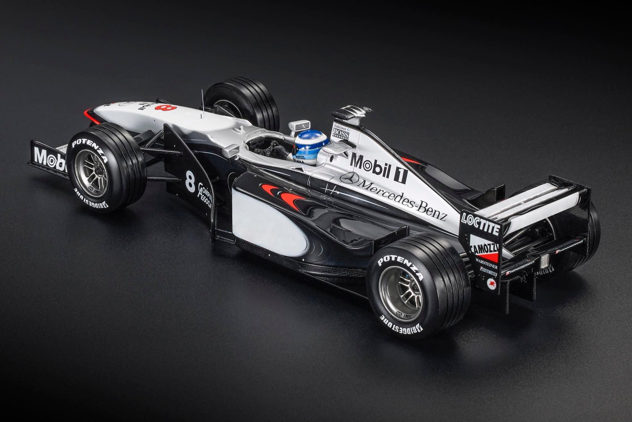 McLaren MP4/13 #8 M.Hakkinen Winner Japan GP 1998 with Pilot Figure 1:18 GP Replicas