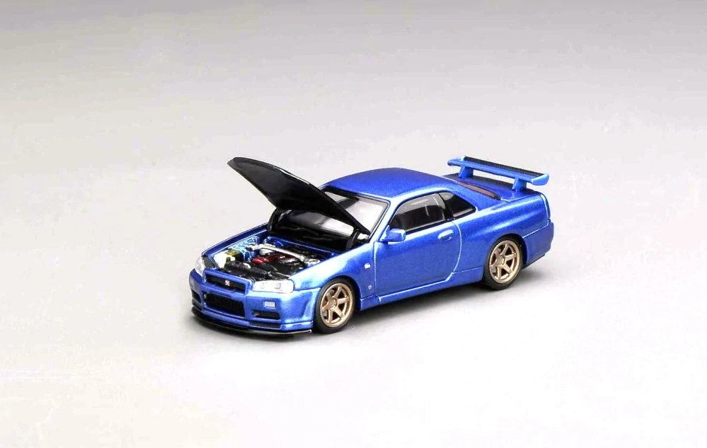 Nissan GT-R (R34) Coupe V-Spec II Costumized 1999 blue/black 1:64 Motorhelix