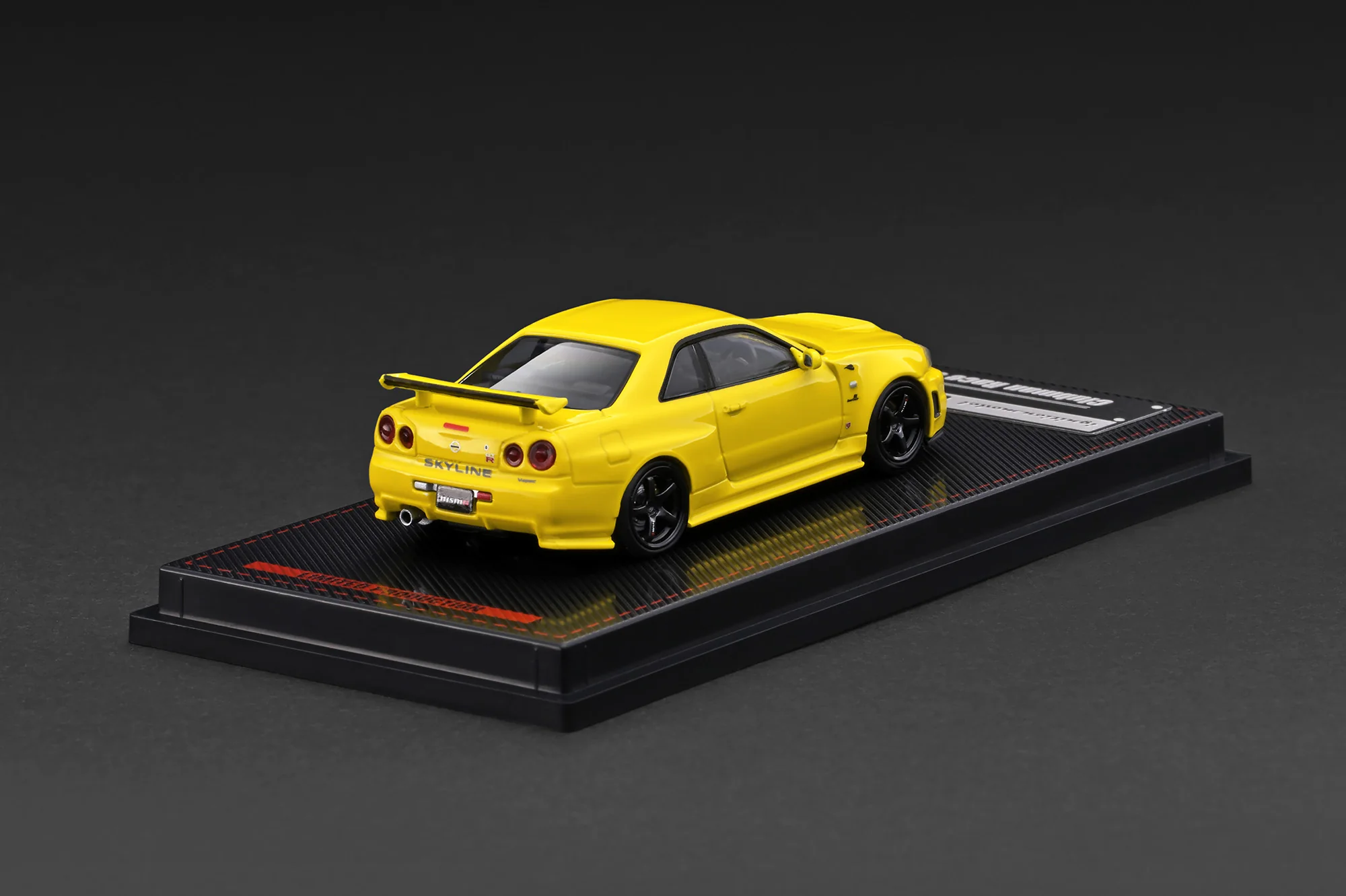 Nissan Skyline GT-R (BNR34) NISMO Customized yellow metallic 1:64 Ignition Model