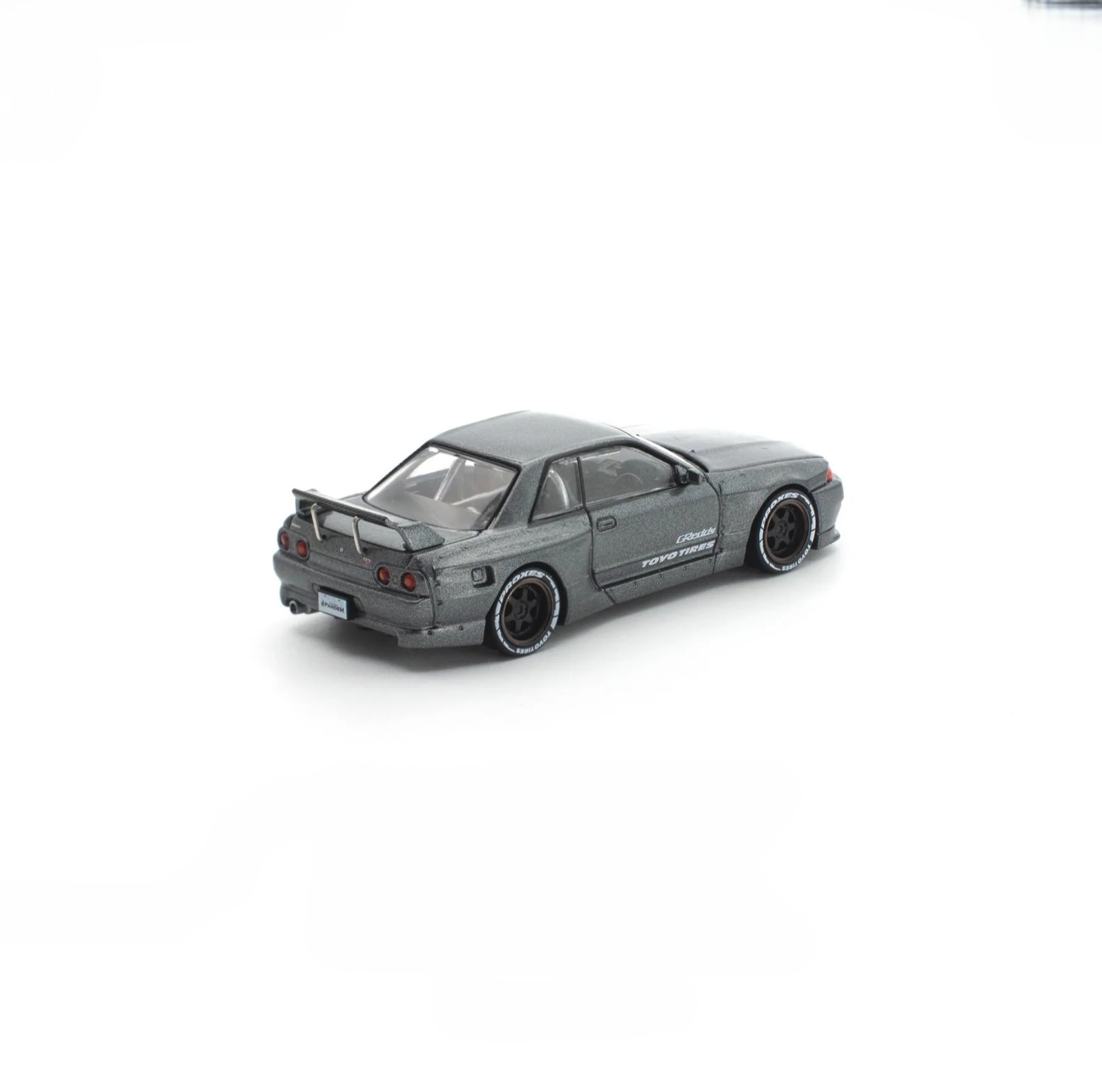 Nissan Pandem R32 gun metal 1:64 Pop Race
