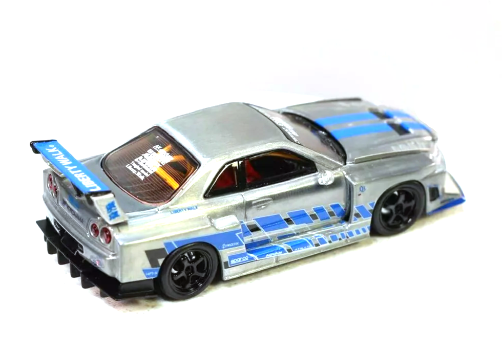 Nissan ER34 Skyline Zamac silver/blue 1:64 Street Weapon