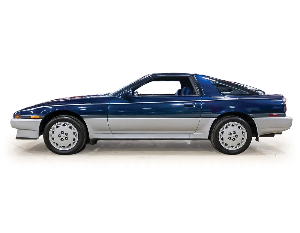 Toyota Supra (A70) 1987 dark blue/silver metallic 1:64 Ixo America