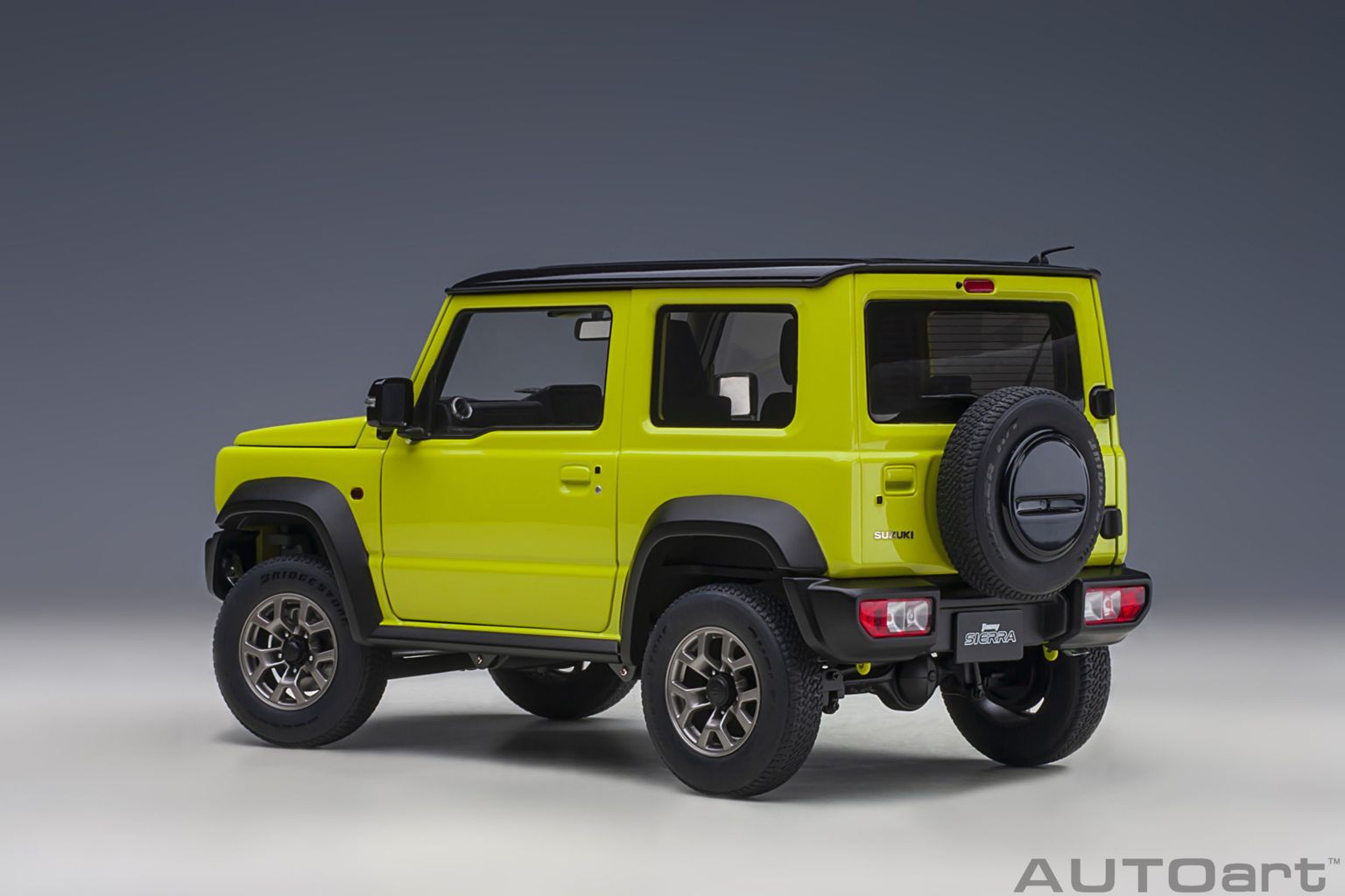 Suzuki Jimny SIERRA 2018 kinetic yellow/black roof 1:18 AUTOart
