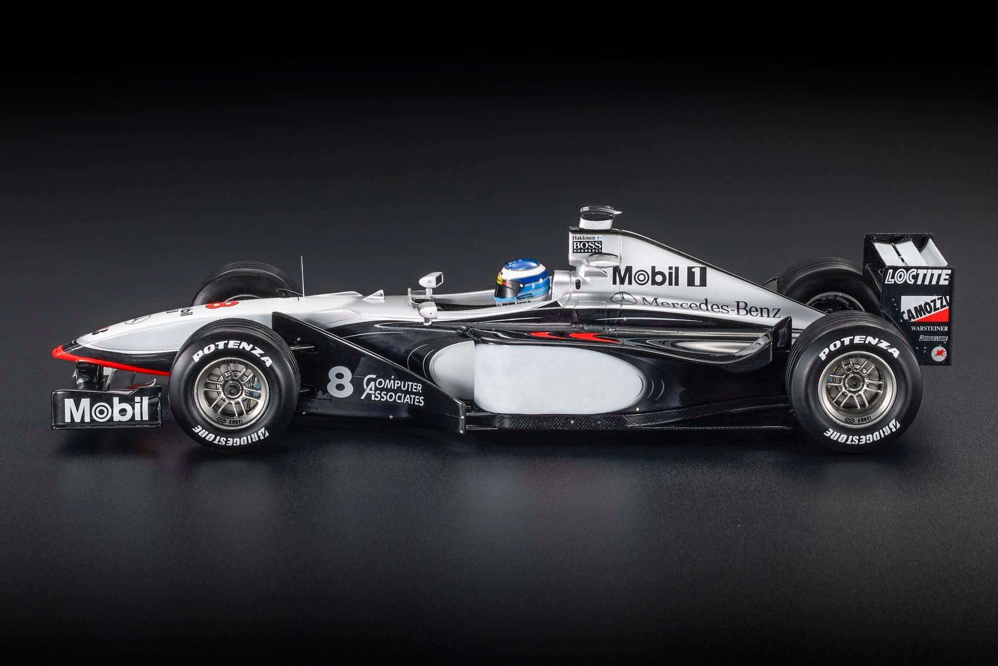 McLaren MP4/13 #8 M.Hakkinen Winner Japan GP 1998 with Pilot Figure 1:18 GP Replicas