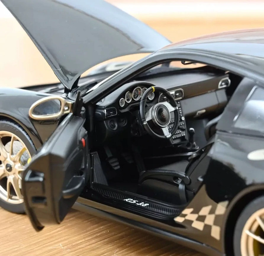 Porsche 911 GT3 RS 2009 black&white gold metallic 1:18 Norev