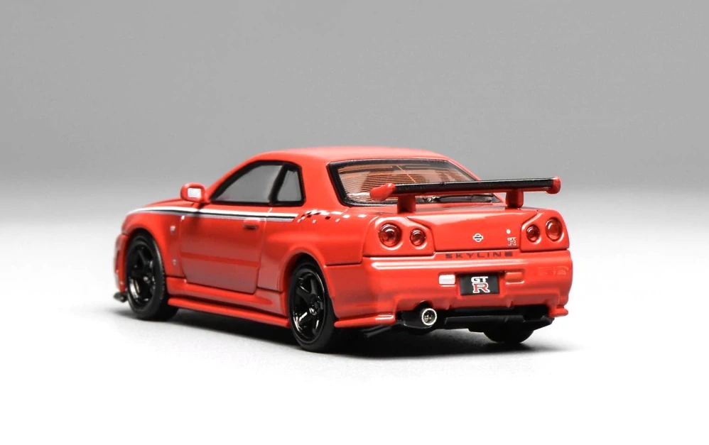 Nissan Skyline GT-R (R34) Coupe Nismo Costumized 1999 red 1:64 Motorhelix