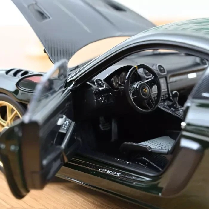 Porsche Cayman GT4 RS with Weissach 2023 brewster green 1:18 Norev