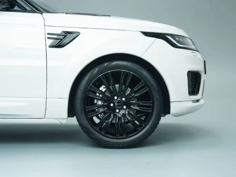 Land Rover Sport white/black wheels 1:18 Whelart