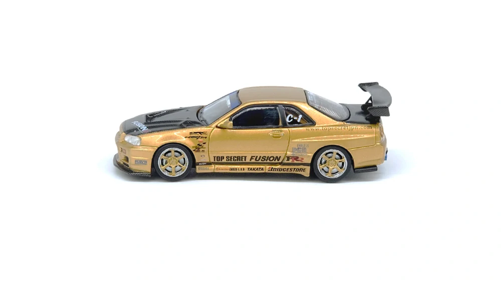 Nissan Top Secret R34 GT-R gold 1:64 Inno Models