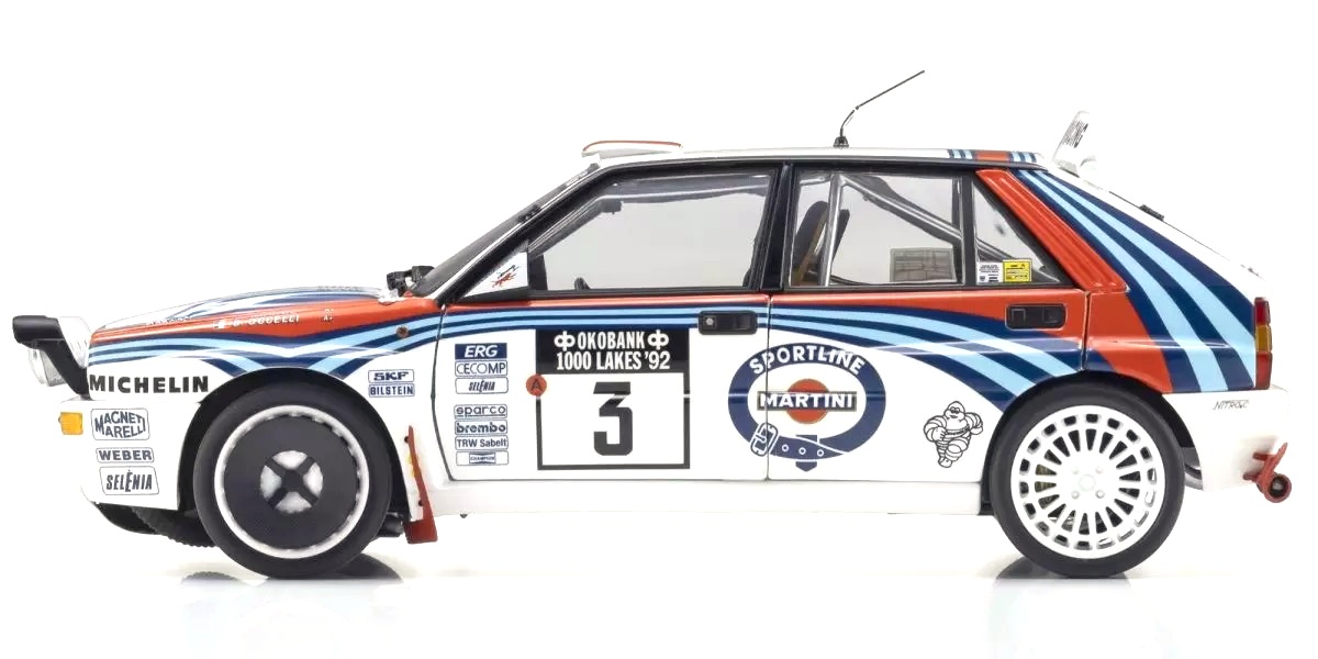 Lancia Delta HF Integrale Evoluzione Martini #3 Auriol/Occelli Winner Rally 1000 Lakes 1992 night version 1:18 Kyosho