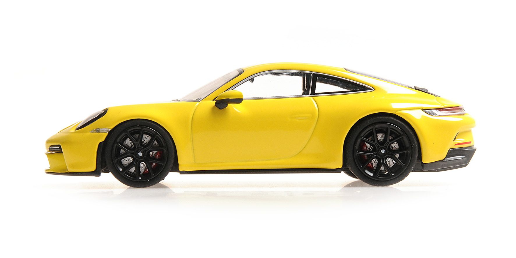 Porsche 911 992 GT3 Touring 2021 yellow/black wheels 1:43 Minichamps