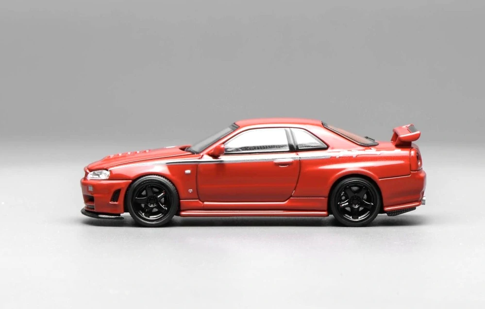 Nissan Skyline GT-R (R34) Coupe Nismo Costumized 1999 red 1:64 Motorhelix