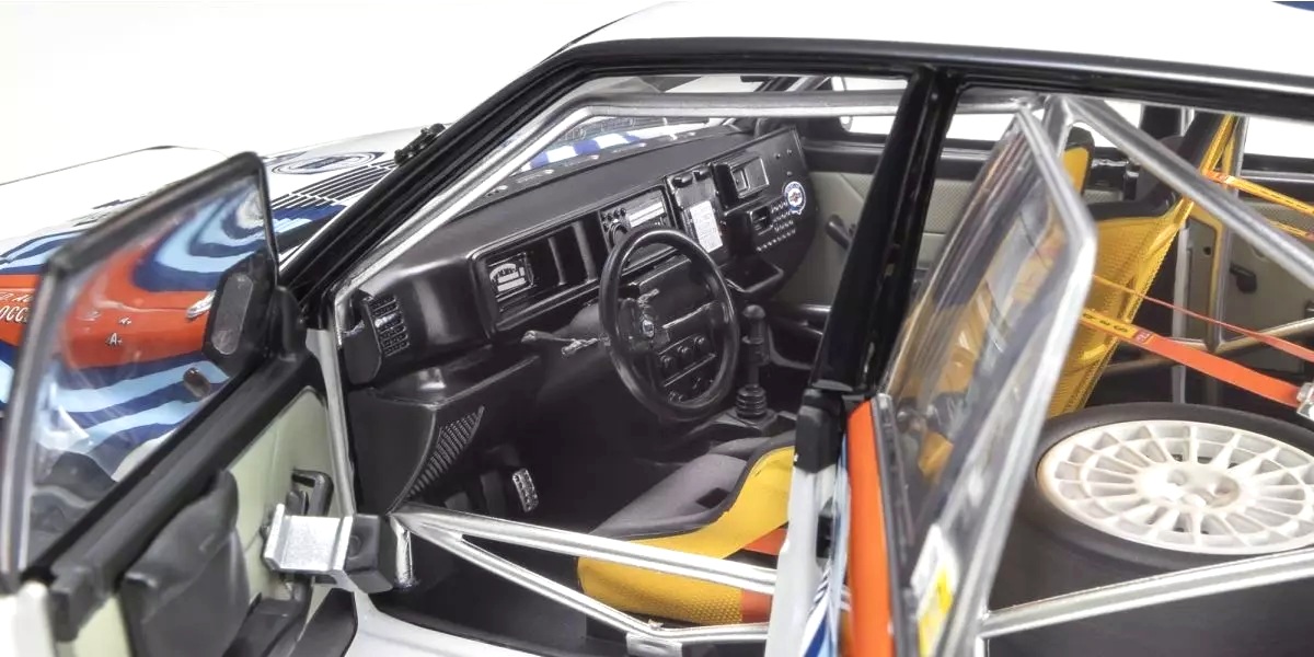 Lancia Delta HF Integrale Evoluzione Martini #3 Auriol/Occelli Winner Rally 1000 Lakes 1992 night version 1:18 Kyosho