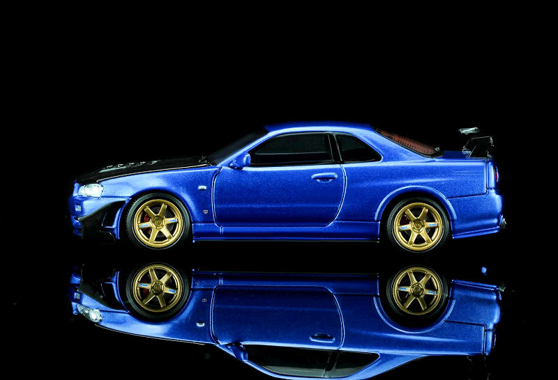 Nissan Skyline GT-R (R34) Customized With GT Aero Kit bayside blue 1:64 Motorhelix 