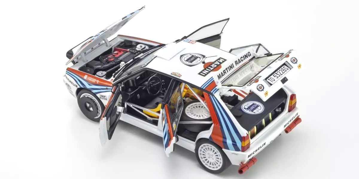 Lancia Delta HF Integrale Evoluzione Martini #4 Kankkunen/Piironen Winner Rally Portugal 1992 night version 1:18 Kyosho