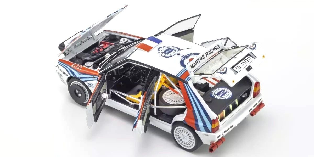 Lancia Delta HF Integrale Evoluzione Martini #3 Auriol/Occelli Winner Rally 1000 Lakes 1992 night version 1:18 Kyosho