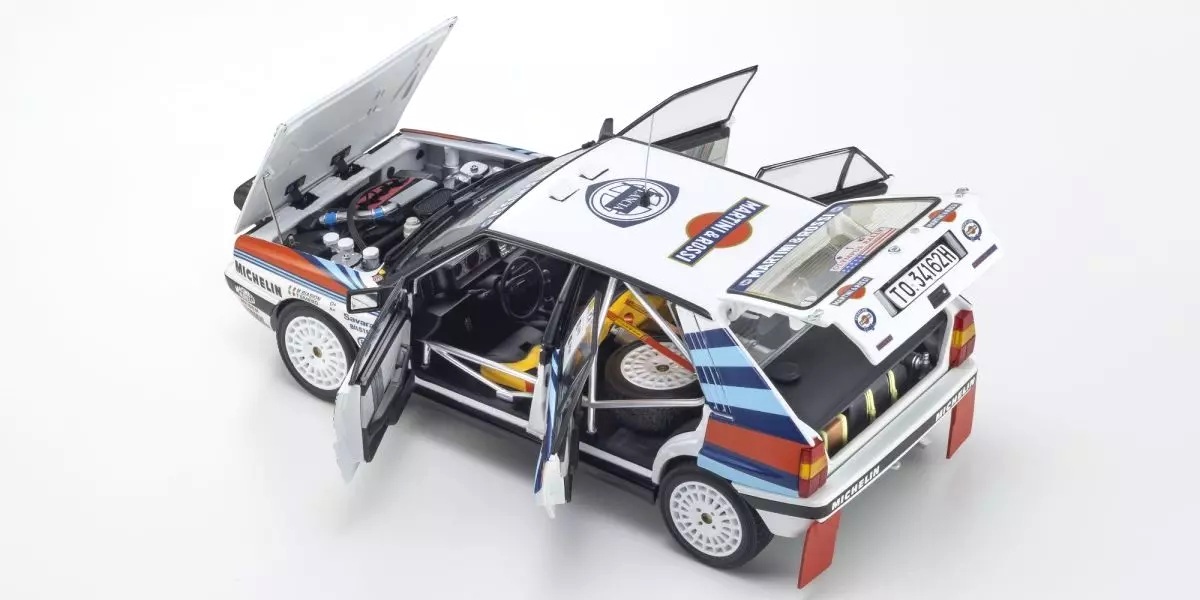 Lancia Delta HF Integrale 8V Martini #1 Biasion/Siviero Winner Rally Olympus 1988 night version 1:18 Kyosho