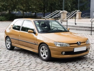 Peugeot 306 S16 1997 blaze yellow 1:18 Norev