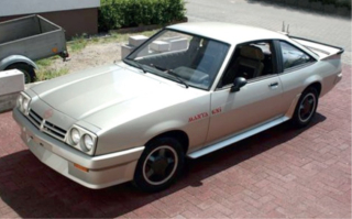 Opel Manta GSi 1987 platin metallic 1:18 Norev