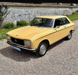 Peugeot 304 Coupé S 1974 corn yellow 1:18 Norev
