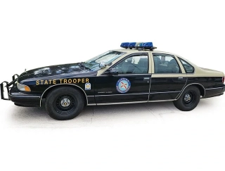 Chevrolet Caprice (9C1) 1995 Florida Highway Patrol black/beige 1:64 Ixo America