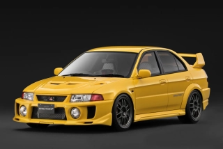 Mitsubishi Lancer EVO V CP9A yellow 1:18 Ignition Model