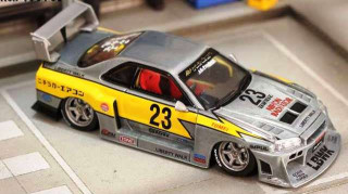 Nissan ER34 Zamac #23 silver/yellow 1:64 Street Weapon